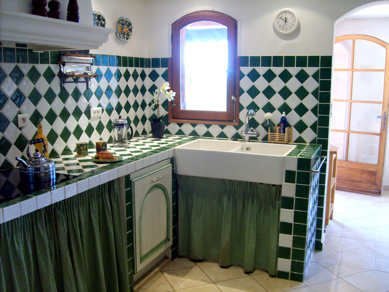 The modern kitchen with a large refrigerator